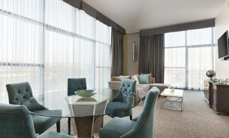 Living area inside day use room at Embassy Suites By Hilton Brea North Orange County.