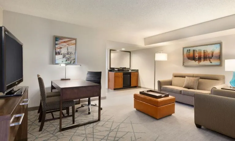 Living area inside day use room at Embassy Suites By Hilton Brea North Orange County.