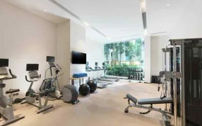 Fully equipped fitness center with treadmills and weights at the Hilton Garden Inn Singapore Serangoon.