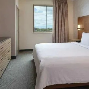 comfortable king bed at Embassy Suites by Hilton Oahu Kapolei.