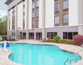 Beautiful outdoor pool area at the Hampton Inn Columbia Northeast-Fort Jackson Area, SC.