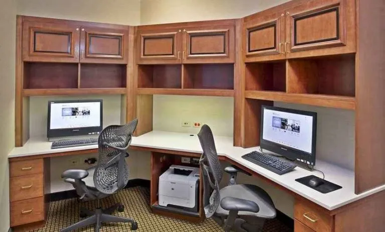 Equipped and professional business center and work station with computer and printer at Hilton Garden Inn Chicago/Midway Airport.
