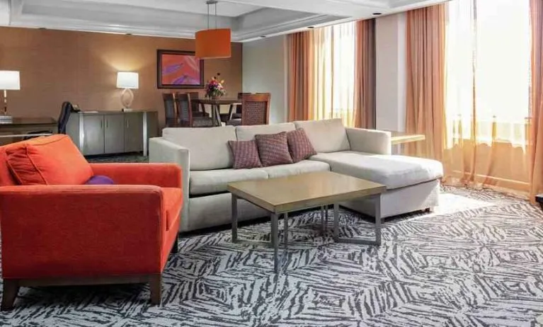 Spacious presidential suite with sofa and lounges at the DoubleTree by Hilton Omaha-Downtown.