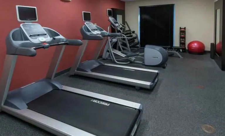 Fitness center with treadmills at the Hilton Garden Inn Tallahassee Central.