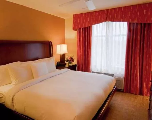 luxurious king suite at Homewood Suites by Hilton Rockville-Gaithersburg.