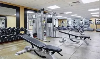 well-equipped fitness center at Homewood Suites by Hilton Rockville-Gaithersburg.