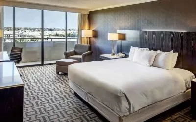 Comfortable king suite with city view at the Hilton Sacramento-Arden West.