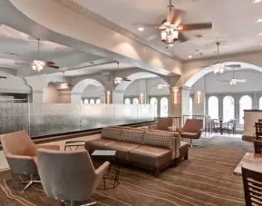 Workspace in an elegant dining area at the Embassy Suites by Hilton Miami - International Airport.