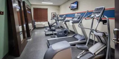 Well-equipped fitness center at Hampton Inn San Francisco Airport.