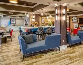 Colorful lobby and coworking space at Hampton Inn San Francisco Airport.