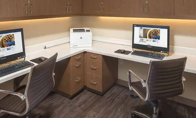 Dedicated business center with PC, internet, printer, and work desk at Hampton Inn & Suites Murrieta Temecula.