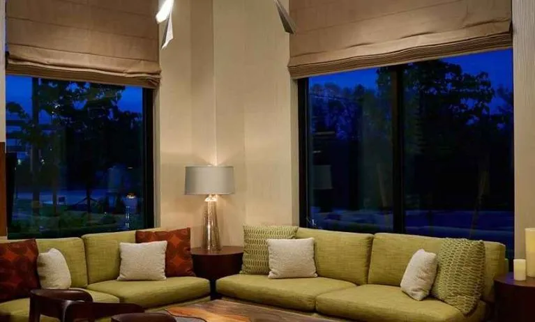 Comfortable lobby lounge area ideal for coworking at Hilton Garden Inn Boston/Marlborough.