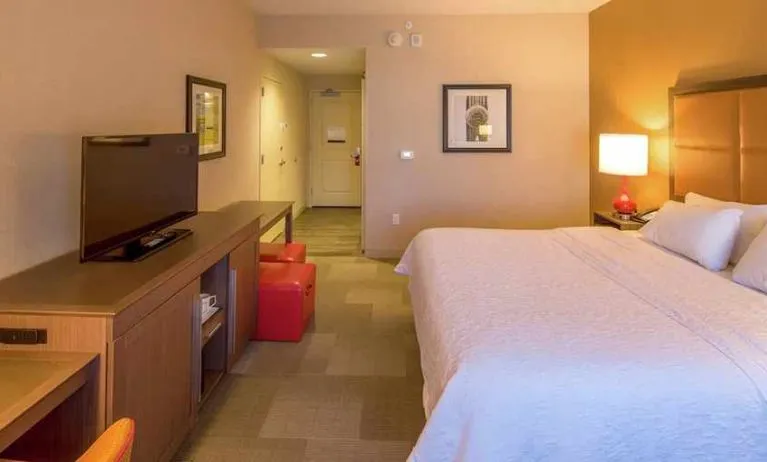 Spacious king room with work desk at Hampton Inn Houston Downtown.