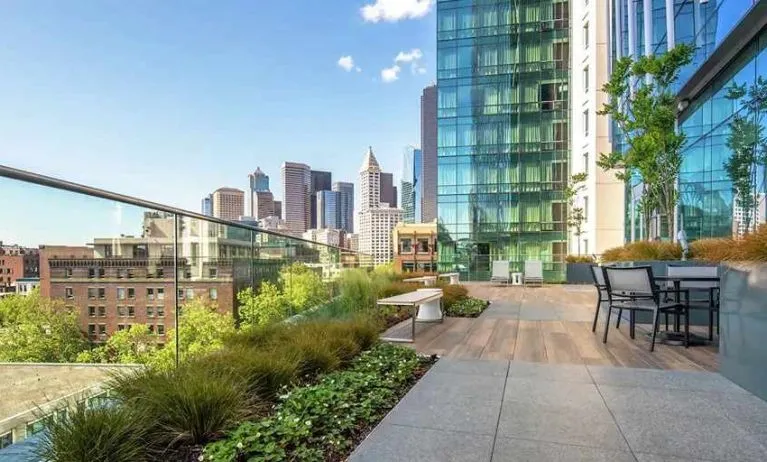 lovely outdoor patio with city scape views at Embassy Suites by Hilton Seattle Downtown Pioneer Square.