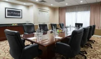 Elegant meeting room with comfortable chairs at the DoubleTree Suites by Hilton Cincinnati-Blue Ash.