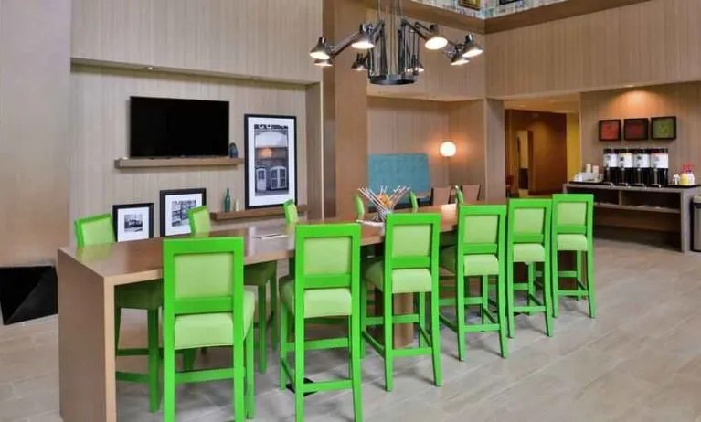 Lobby workspace perfect for co-working at the Hampton Inn & Suites St. Paul Oakdale/Woodbury by Hilton.