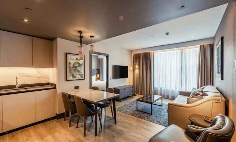 Hotel apartment with kitchen and living room at the Fellows House Cambridge, Curio Collection by Hilton.