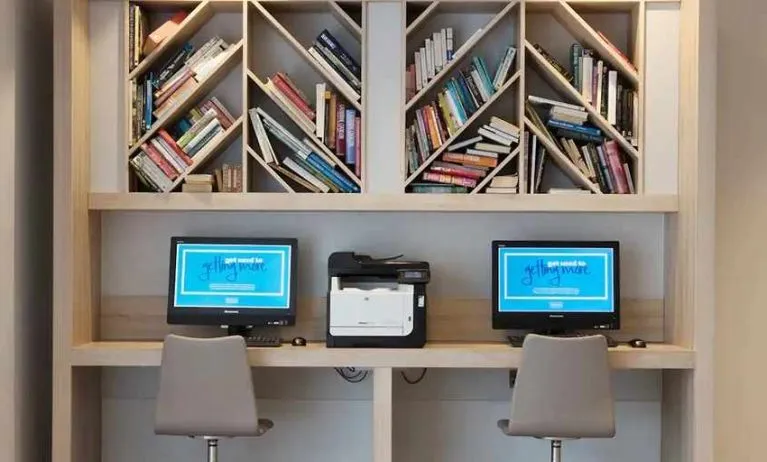 dedicated business center with workspace, PC, internet, and printer at Hampton by Hilton Exeter Airport.