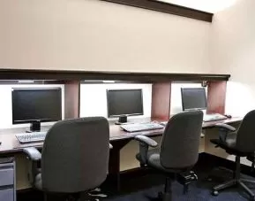 Professional business center with PC, phone, work desks, and printer ideal for working remotely at DoubleTree by Hilton Hotel Downtown Wilmington - Legal District.