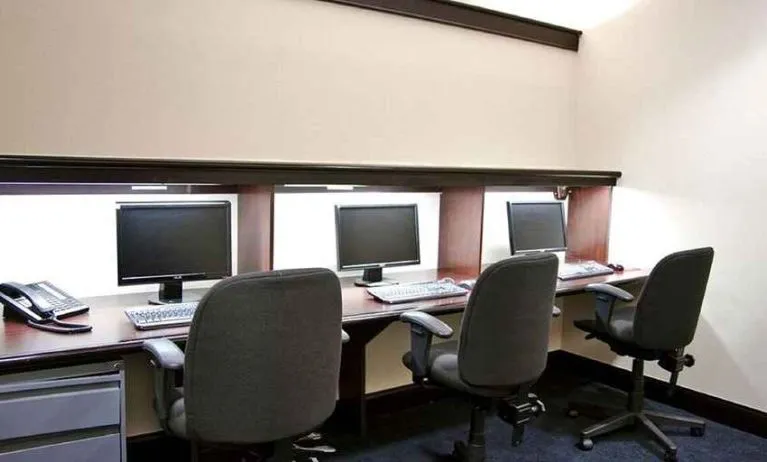 Professional business center with PC, phone, work desks, and printer ideal for working remotely at DoubleTree by Hilton Hotel Downtown Wilmington - Legal District.