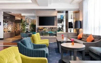 Comfortable lobby workspace with sofas at the Hilton Garden Inn Dublin Custom House.