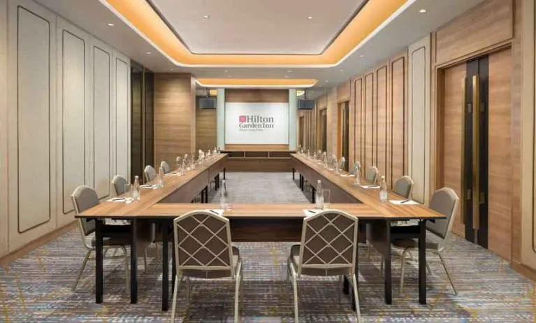 Elegant meeting room with u shape table at the Hilton Garden Inn Jakarta Taman Palem.