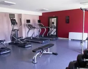 Fitness center at the Hampton by Hilton Toulouse Airport.