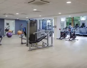 Well equipped fitness center at Hilton London Watford.