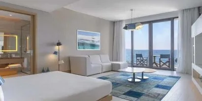 luxurious king suite with gorgeous water views at Susona Bodrum, LXR Hotels & Resorts.