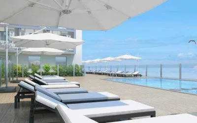 Relaxing outdoor pool area with lounges at the Hilton Garden inn Casablanca Sud.