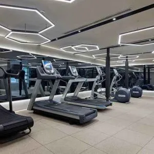 well equipped fitness center with treadmills at Hagia Sofia Mansions Istanbul, Curio Collection by Hilton.