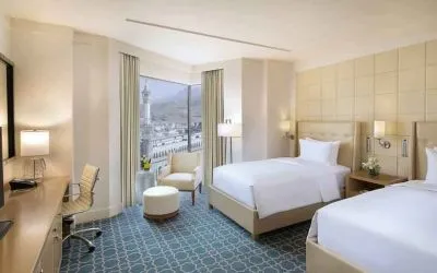 Twin room with desk at the Hilton Makkah Convention Hotel.
