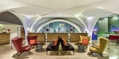 Stylish lobby workspace at the DoubleTree by Hilton Sukhumvit Bangkok.