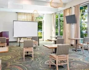 Bright meeting room with large windows at Embassy Suites by Hilton Oahu Kapolei.