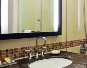 clean and spacious bathroom with shower at Hampton by Hilton Vadodara-Alkapuri.