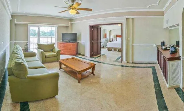 Living room in a hotel suite at the Villa Mercedes Merida, Curio Collection by Hilton.