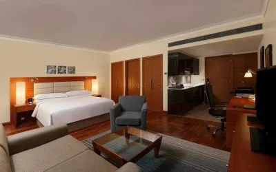 Comfortable king bedroom at the Hilton Bangalore Embassy GolfLinks.