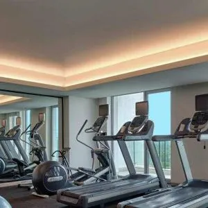Fitness center at the DoubleTree Suites by Hilton Bangalore.