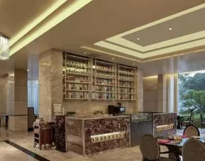 Hotel workspace at the DoubleTree Suites by Hilton Bangalore.