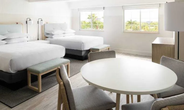 Twin room with working station at the Hampton By Hilton Grand Cayman.