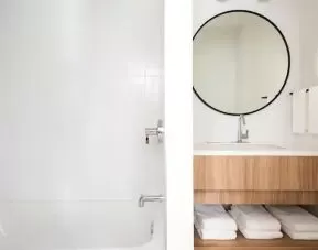 Guest bathroom at the Hampton By Hilton Grand Cayman.