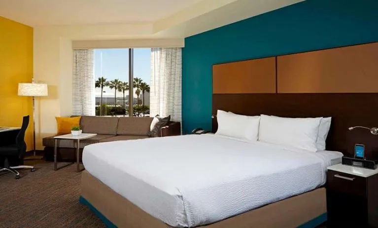 King bedroom with workstation at Residence Inn By Marriott LAX Airport.
