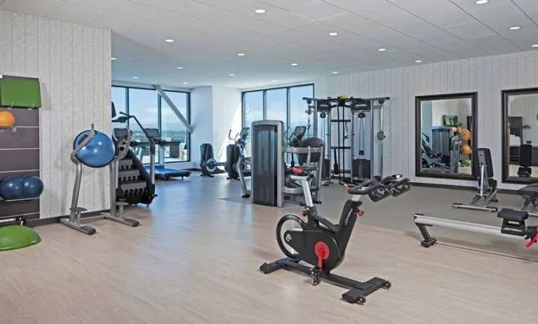 Fitness center available at H Hotel Los Angeles, Curio Collection By Hilton.
