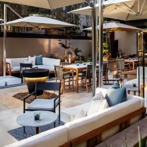 Comfortable lounge and coworking space at The Ambrose Hotel Santa Monica.