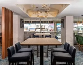 The on-site restaurant has both indoor and outdoor tables, and a bar.
