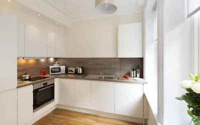 The Hammersmith One’s kitchen, including kettle, oven, microwave, and toaster.
