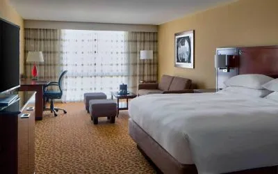 Day use room with work desk and sofa at Houston Marriott South At Hobby Airport.