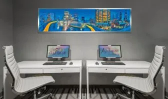 Dedicated business center with PC, internet, and printer at Hotel Clique Calgary Airport.