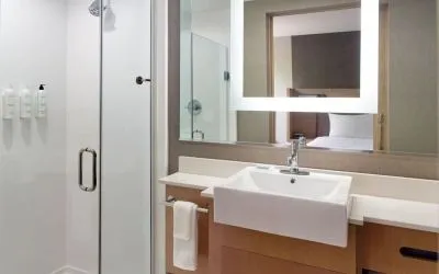 Private guest bathroom with shower at SpringHill Suites Atlanta Northwest.