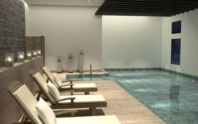 Stunning indoor pool with sun beds at Doubletree By Hilton Toluca.